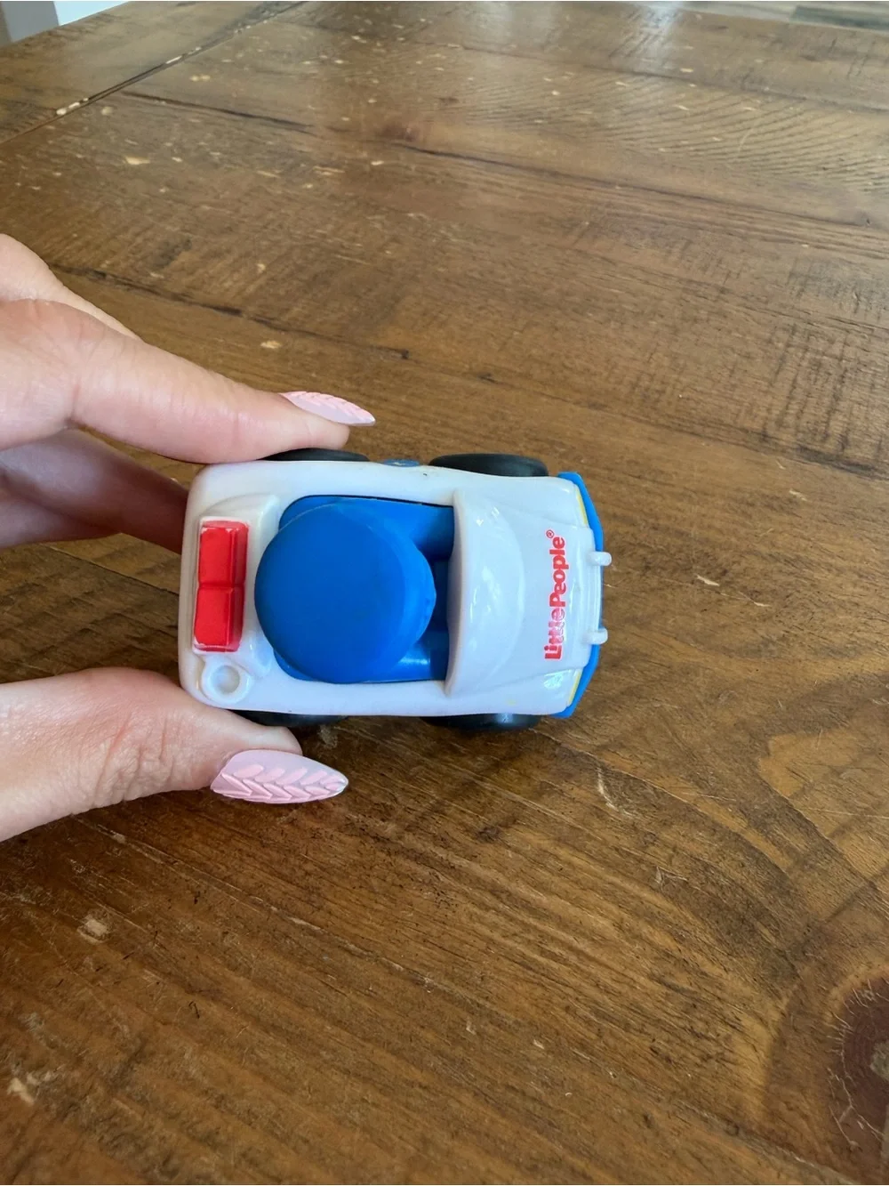 Fisher Price Little People police wheelie as is